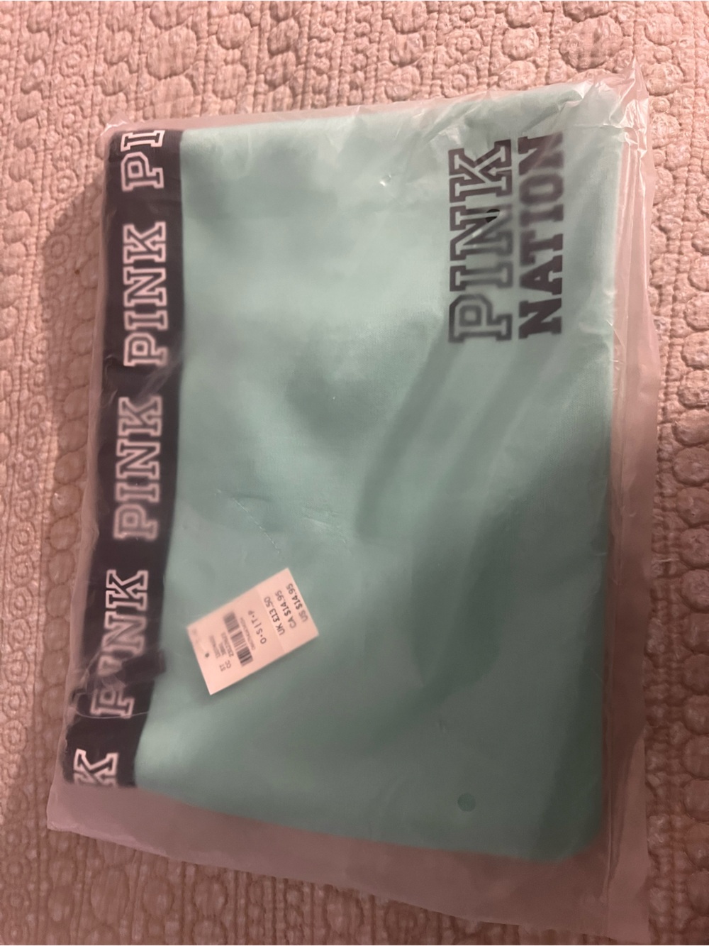 PINK mint zip pouch with black logo trim